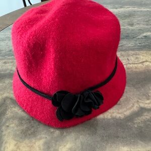 Vibrant Red Hat with Black Flower Accent